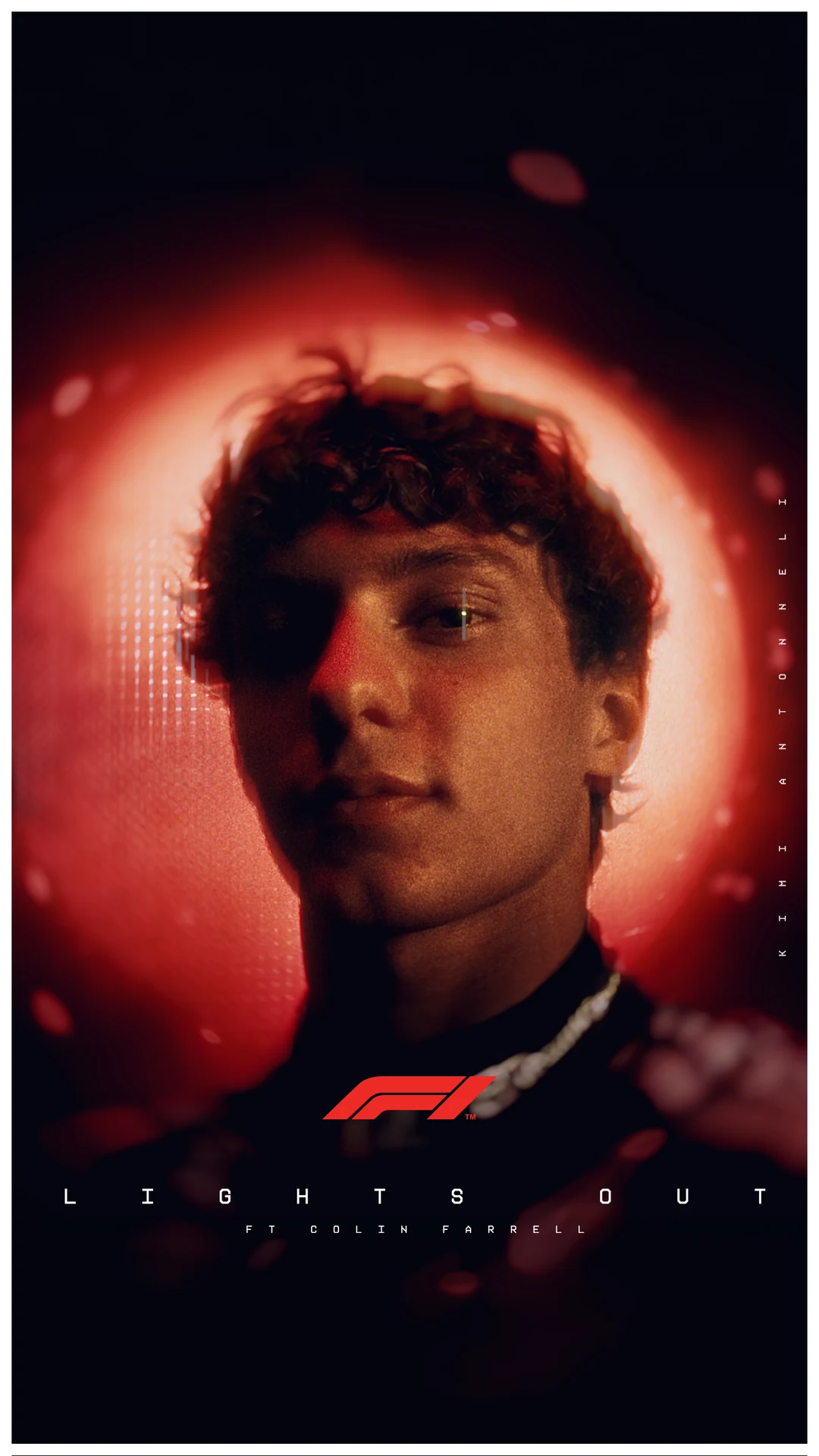 Kimi Antonelli head-on, framed by a soft red ring of light · Lights Out, F1