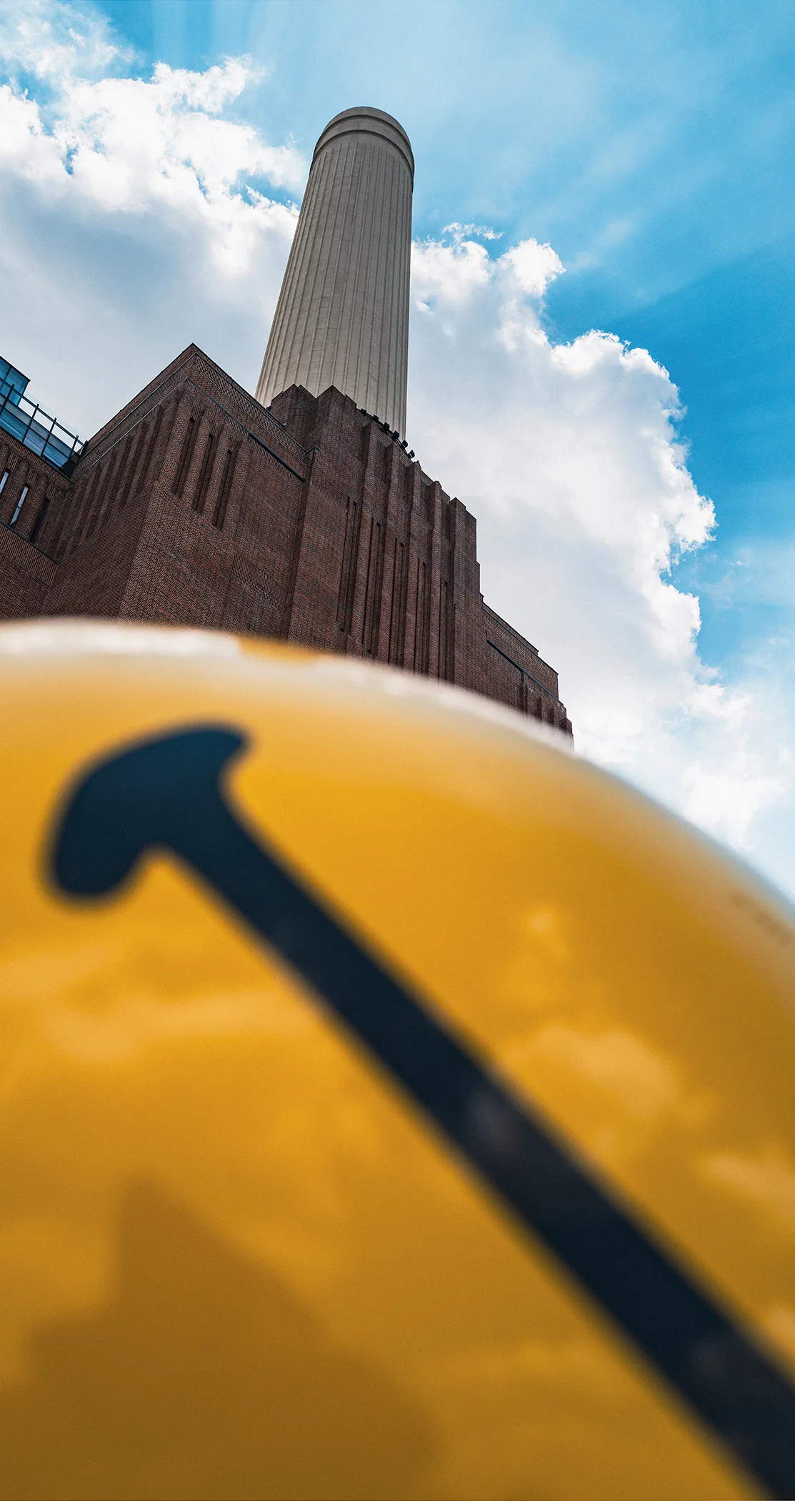 Battersea Power Station chimney against dramatic clouds