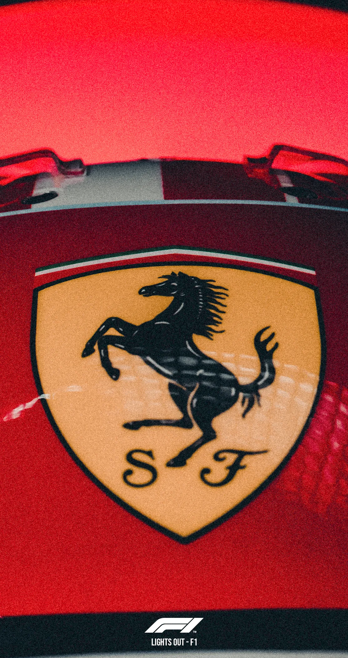 A Ferrari shield on the side of a helmet, close, Lights Out